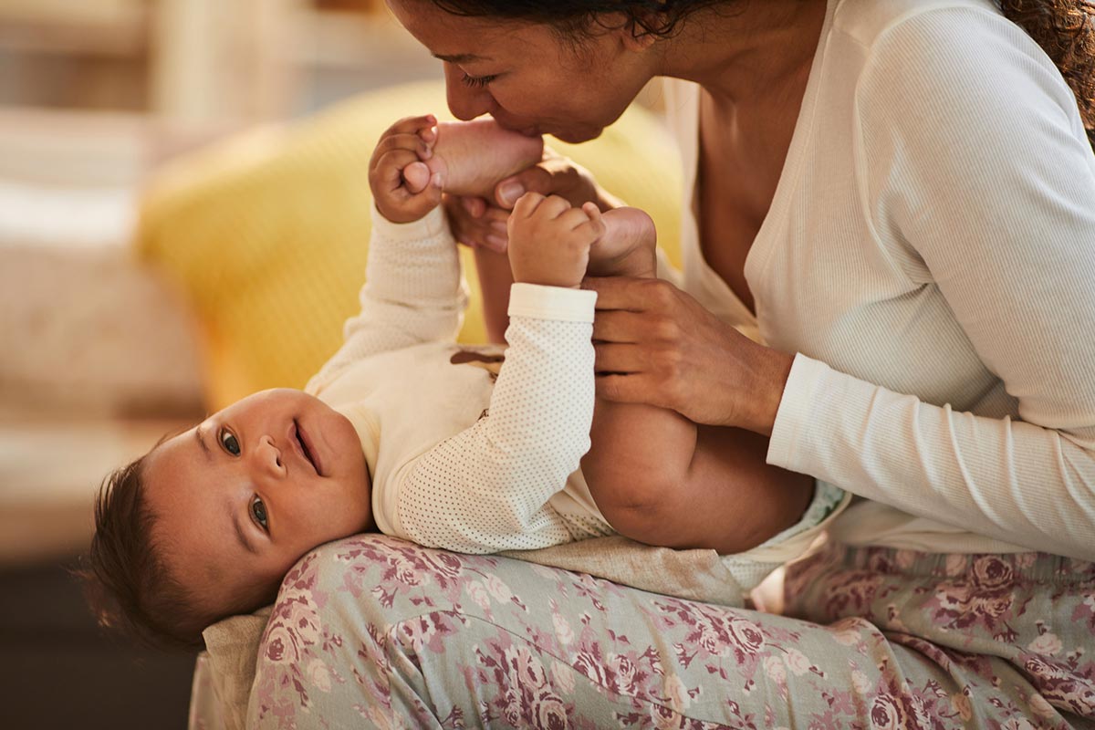 mom and baby playing