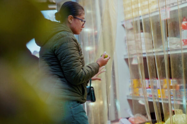 Jennymarie picking lime at supermarket